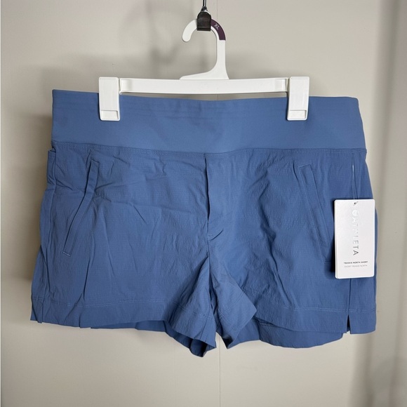 Athleta Pants - NWT ATHLETA Size 16 Light Blue Trekkie North Shorts. Has zipper pockets